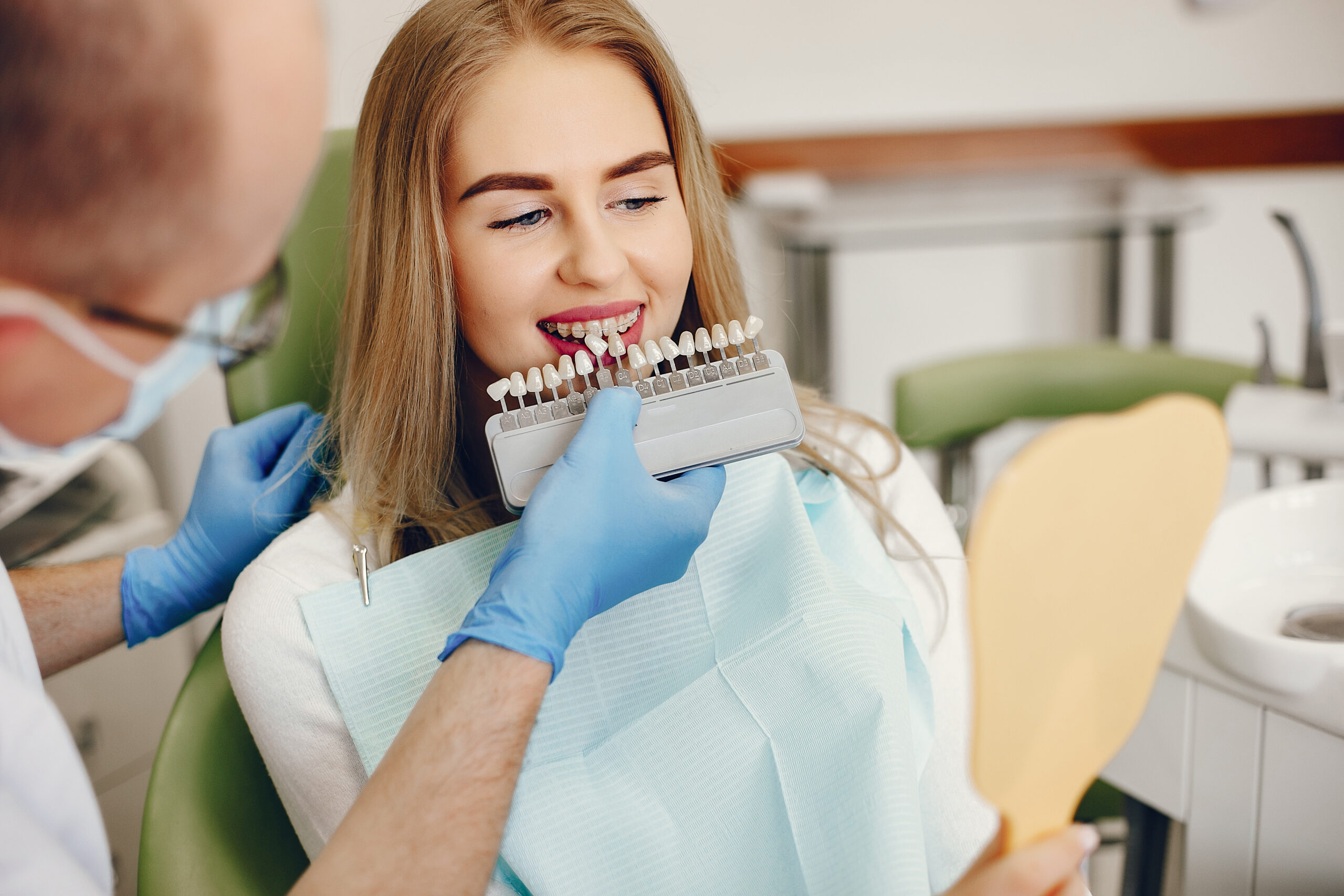 Beautiful lady in the dentist's office. Woman in a uniform